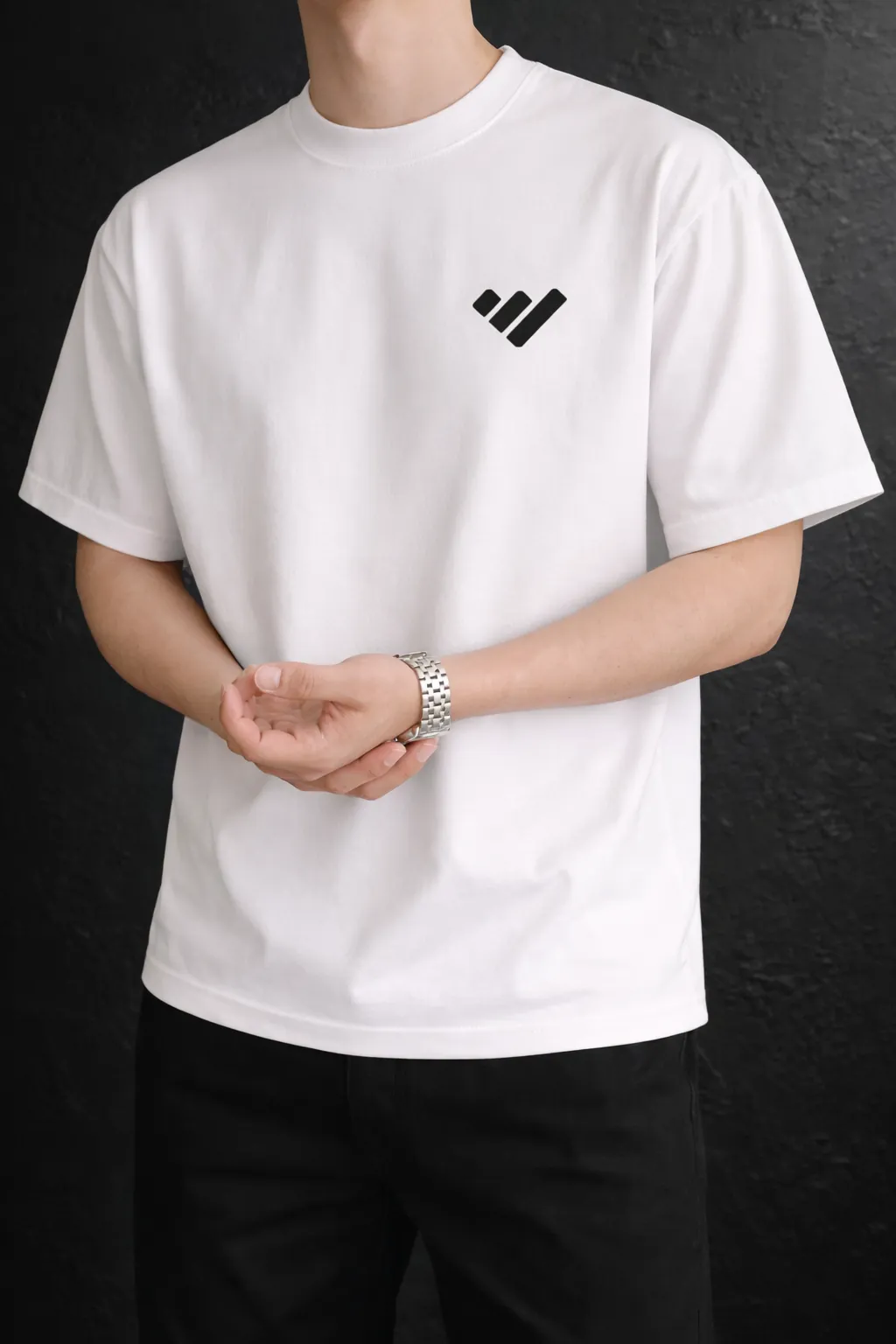 Warsnis white tee styled in an outdoor luxury setting