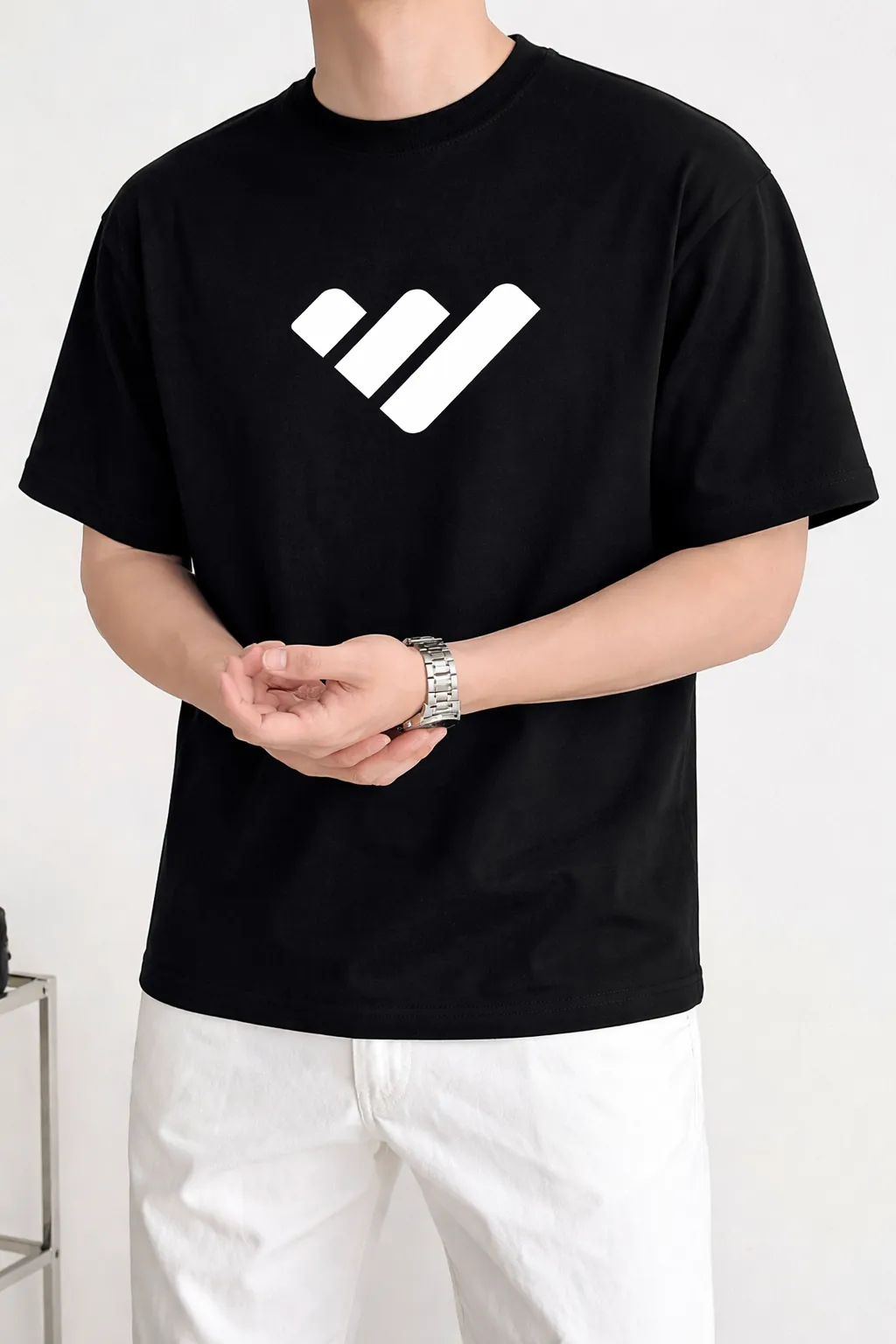 Warsnis white tee styled in an urban luxury setting